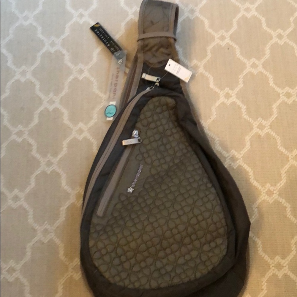 Sherpani small backpack with multiple zippers